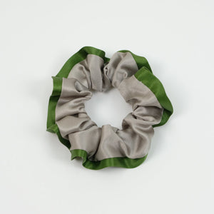 a khaki silk scrunchie with grass green edge