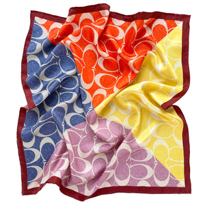 a luxury square silk scarf in lilac oink, blue, orange and yellow featuring burgundy hand-rolled edges and classic print