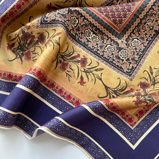 a vintage vibe boho chic square silk scarf with indigo base and hand-rolled hems, featuring retro charm floral print