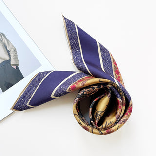 a vintage vibe boho chic square silk scarf with indigo base and hand-rolled hems, featuring retro charm floral print