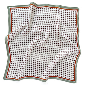 a white base pinted silk bandana scarf with pea green and orange edge, featuring burgundy geometric block print