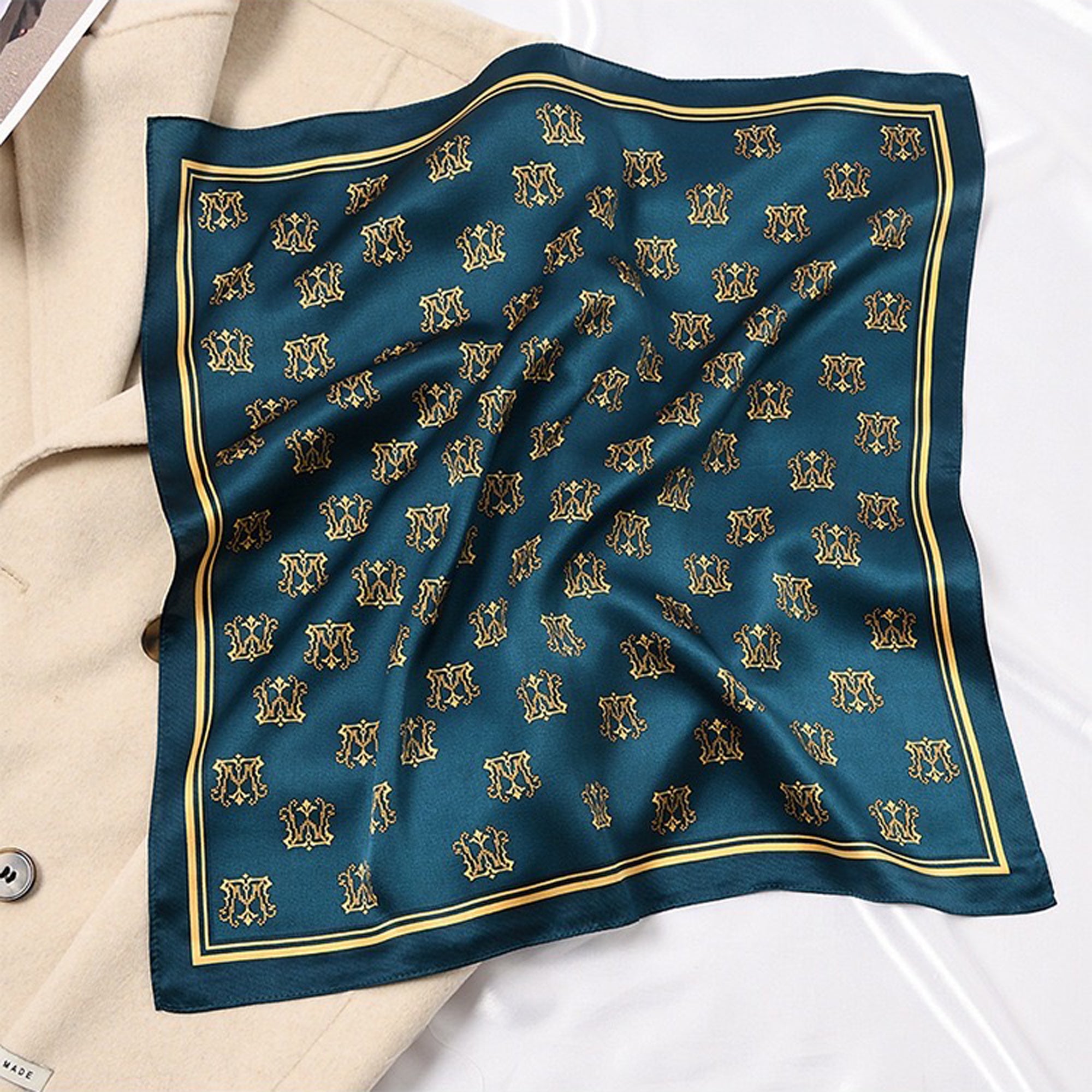 an ocean blue square silk scarf neckerchief featuring crown print