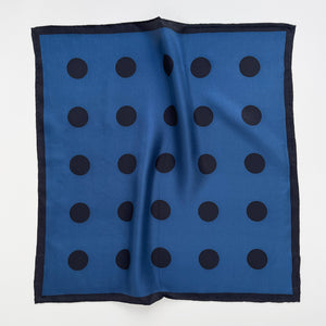 a Yale blue silk bandana scarf featuring black polka dots print