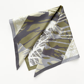 a forest leafy printed square silk scarf in sage green, grey and white tones with hand-rolled edges