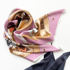 a pink silk square scarf featuring acrobatic dancers print in elegant pink and beige brown hues