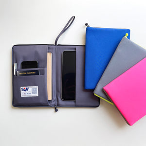 recycled iPad mini case/travel organizer in three different colours: blue, grey and neon pink