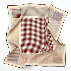 a deep red houndstooth pattern square silk scarf with hand-rolled hems