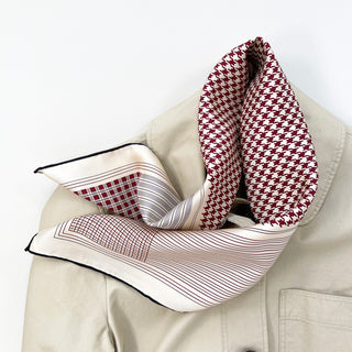 a deep red houndstooth pattern square silk scarf with hand-rolled hems