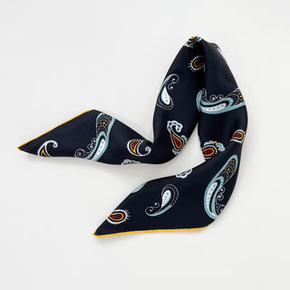 a black square silk scarf with boho paisley pattern and hand-rolled hems