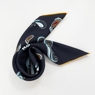 a black square silk scarf with boho paisley pattern and hand-rolled hems