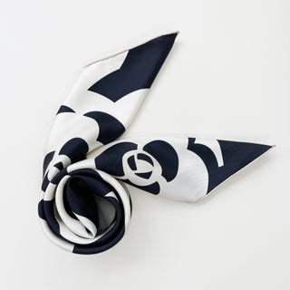 a luxury black and white camellia print large square silk scarf with hand-rolled hems