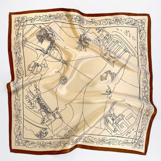 53x53 cm bandana silk scarf with a beige background featuring a detailed, line-drawn map design. The map is outlined in black, depicting landmarks and buildings, framed by a decorative floral border. The scarf has a rich brown border framing the intricate design.