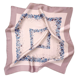 a blush pink square silk scarf for women featuring blue and burgundy leafy print
