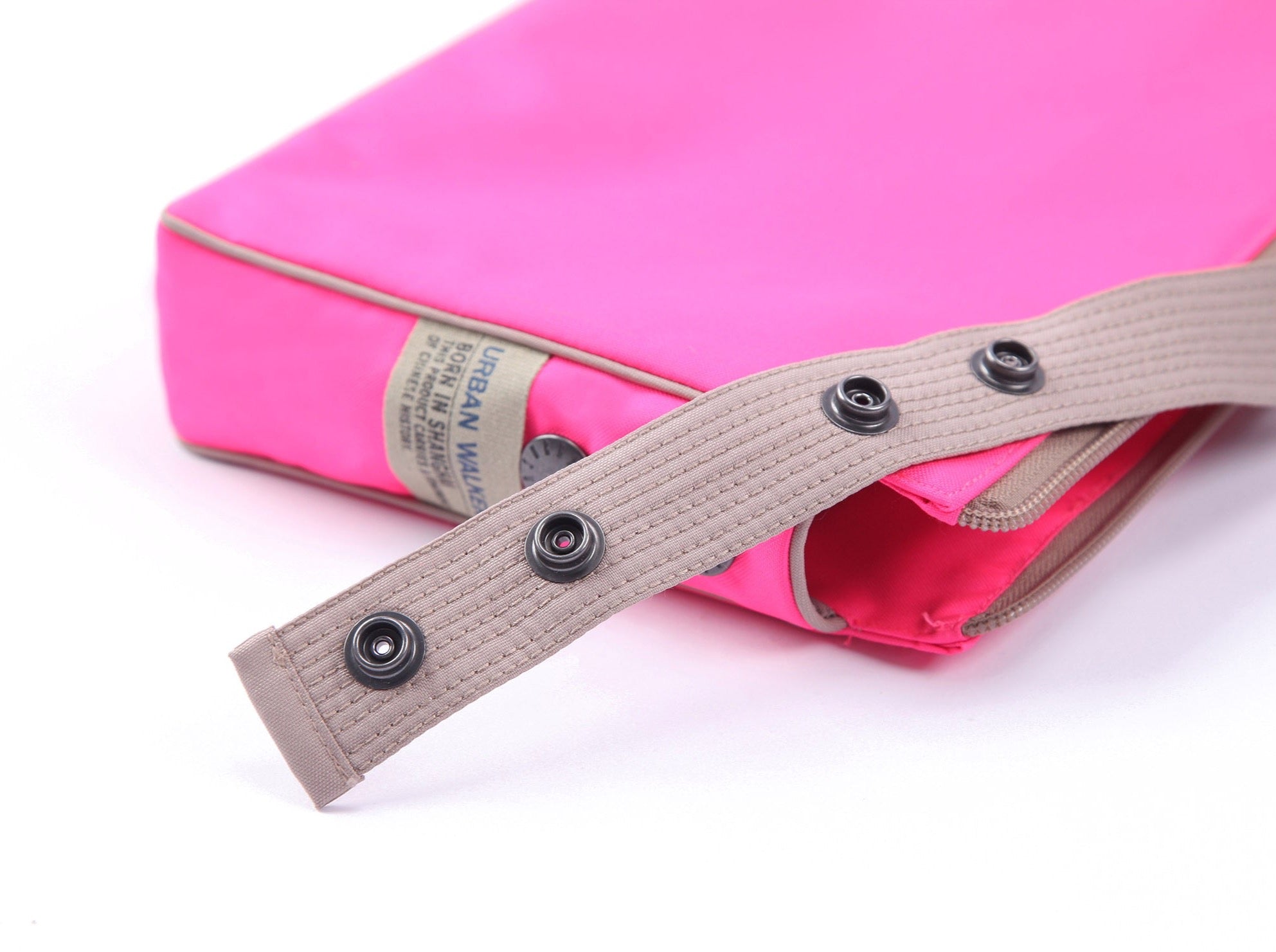 a neon pink recycled crossbody bag