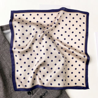 a champagne small silk scarf/neckerchief with polka dot pattern