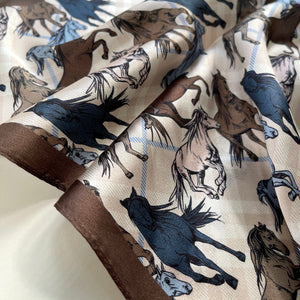 a brown and dusty blue palette horse print silk neckerchief/bandana scarf