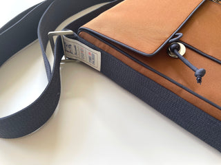 Recycled brown preppy style messenger bag with navy strap