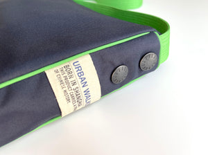 a navy blue recycled crossbody bag