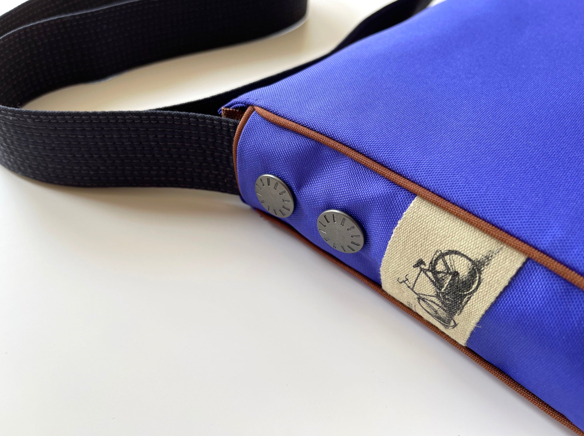 an indigo blue recycled crossbody bag