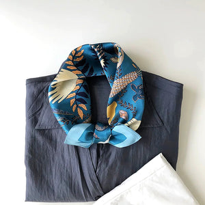 a dusty blue small silk scarf/bandana/neckerchief with tarot print